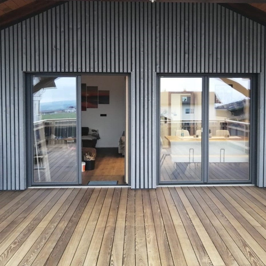 Facciata in legno di larice bisellate in Nordic Grey